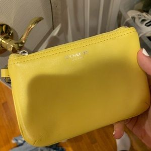 yellow coach wristlet